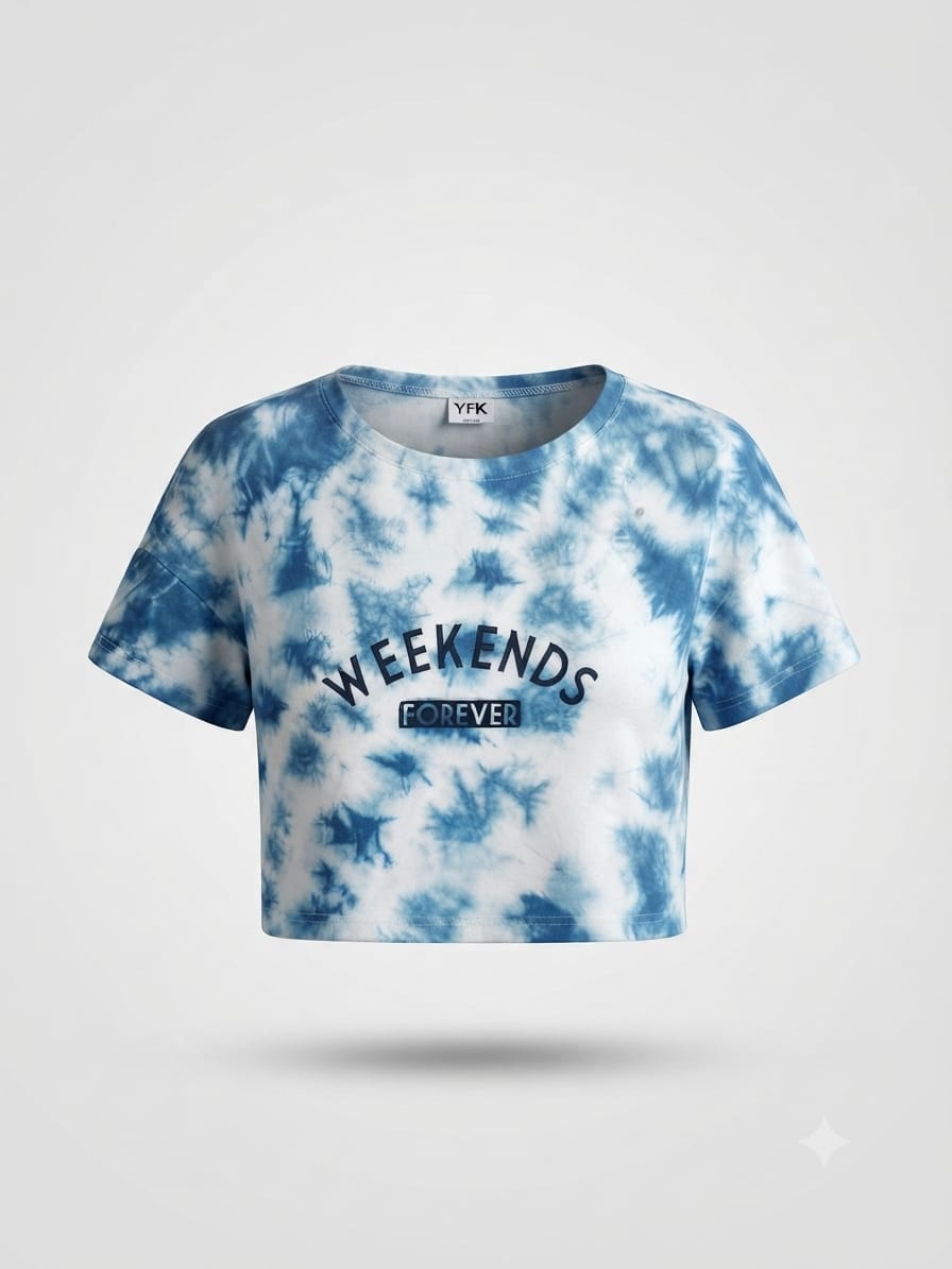 Kids tie-dye crop top with pink, yellow, and blue pattern, printed text "Dreaming of the Weekend Since Monday"